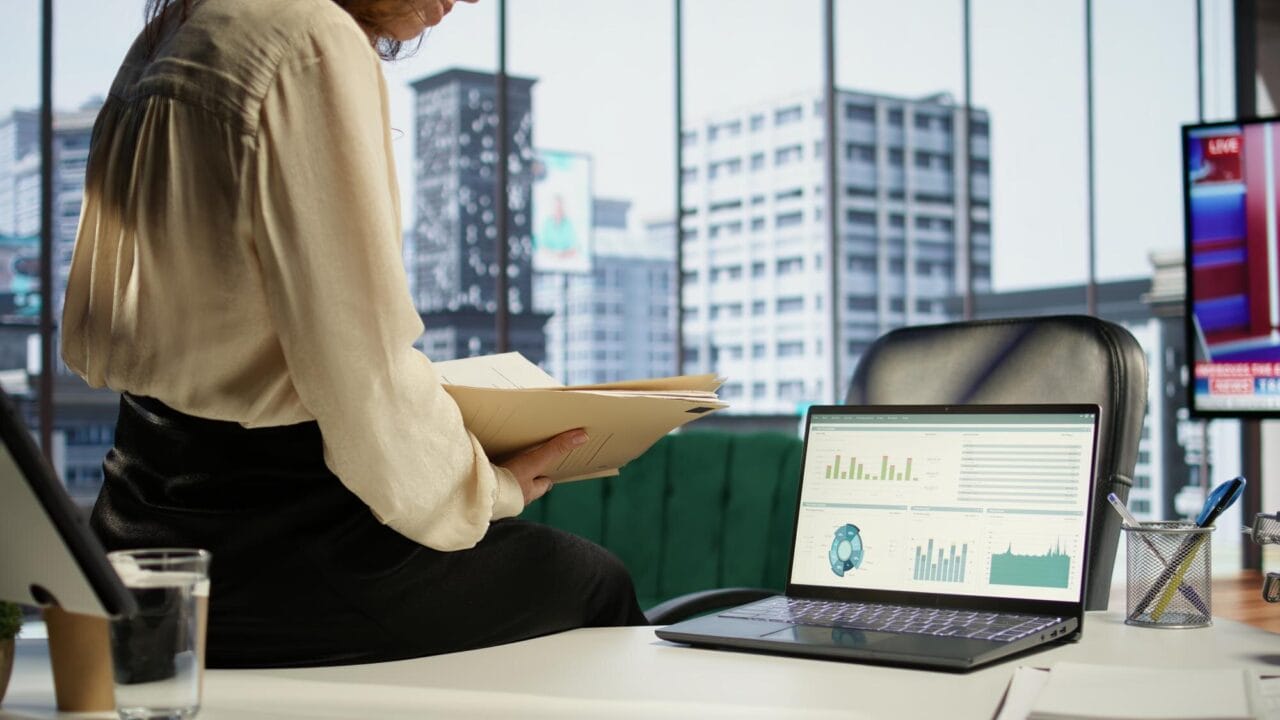 Professional woman reviewing documents in office